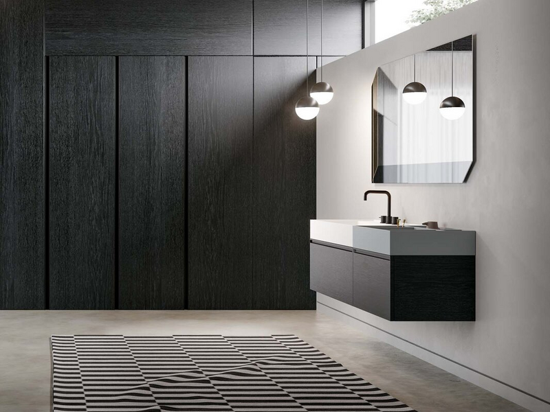 Bagno in essenza rovere carbone, vassoio contenitore in Fenix NTM grigio Antrim, top in marmo minerale bianco opaco, maniglie in metallo nero