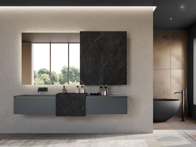 Bagno in fenix NTM grigio bromo, laccato opaco grigio antracite, elemento monoblocco in gres Storm nero e gola in metallo titanio