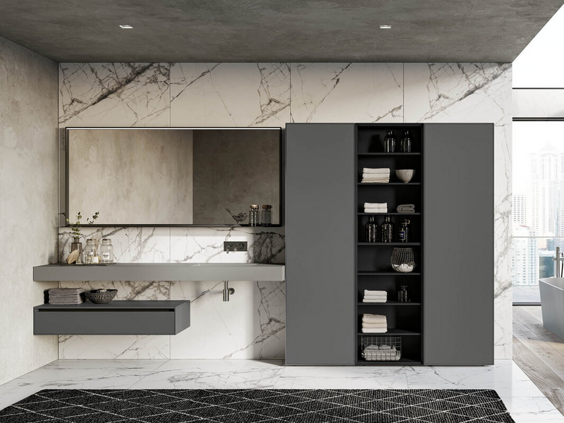 Bagno in laccato opaco micalizzato piombo, vani a giorno in laccato opaco nero, top in marmo minerale grigio